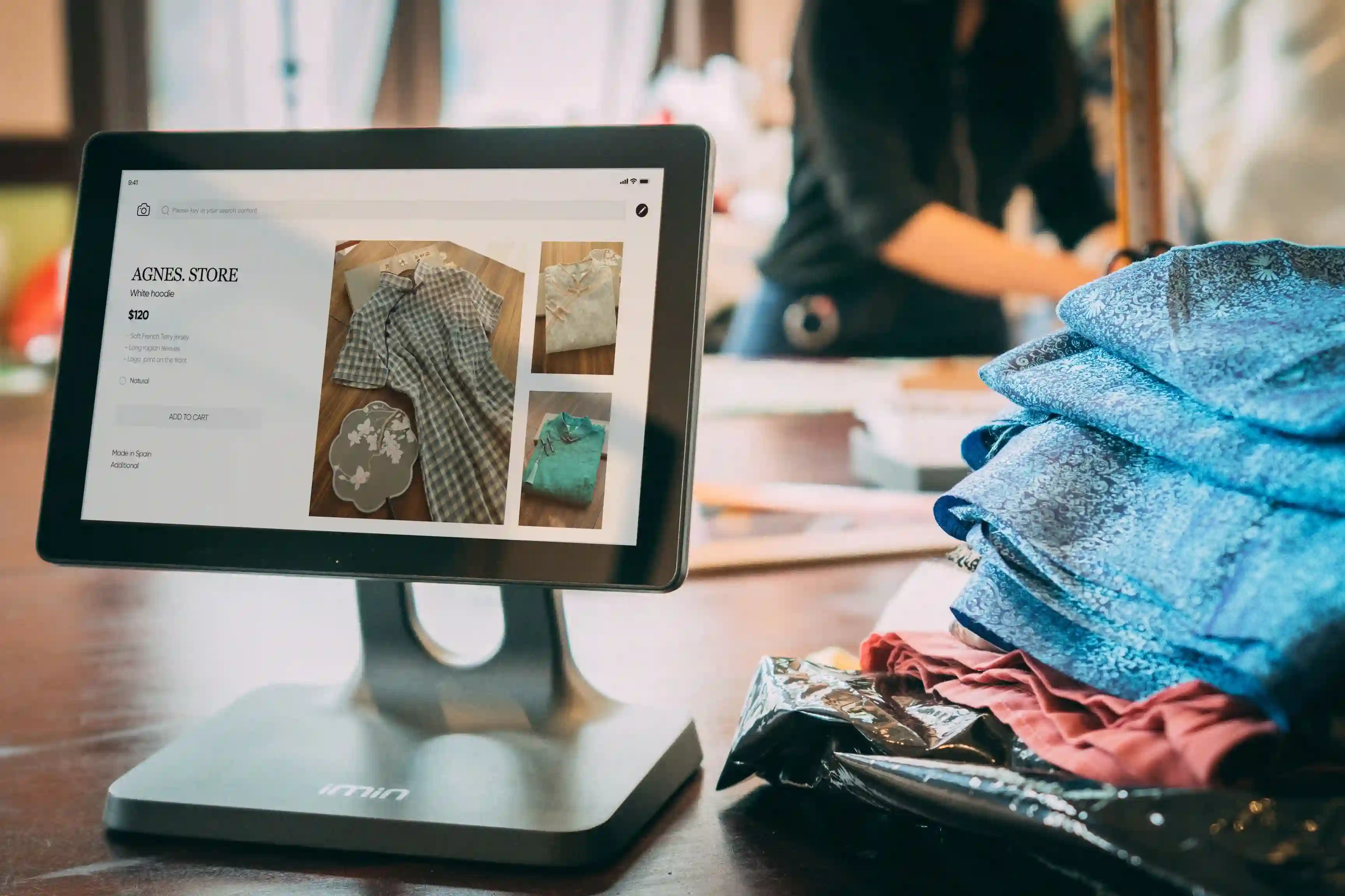 Modern retail boutique store with digital POS systems